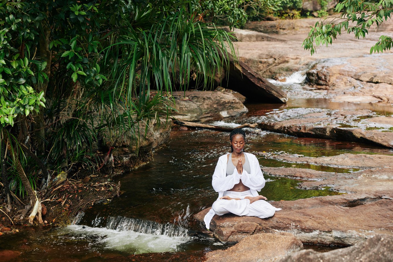 Woman Meditating in Nature