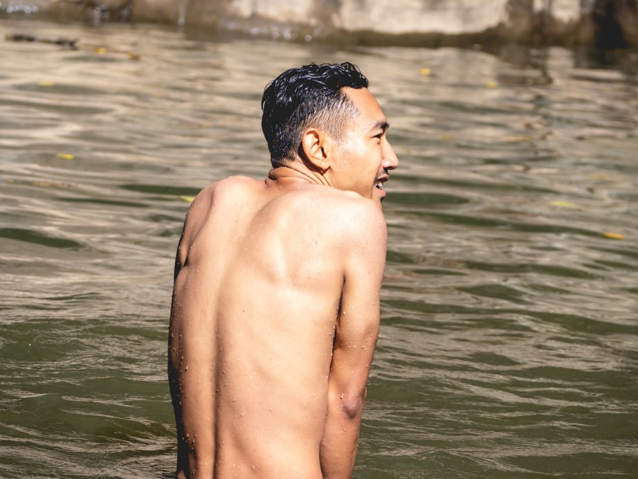 Swimming Man in Natural Pool